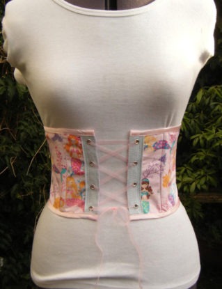 underbust corset mermaid waspie in pale pink.  Front lacing.  One of a kind steampunk buy now online