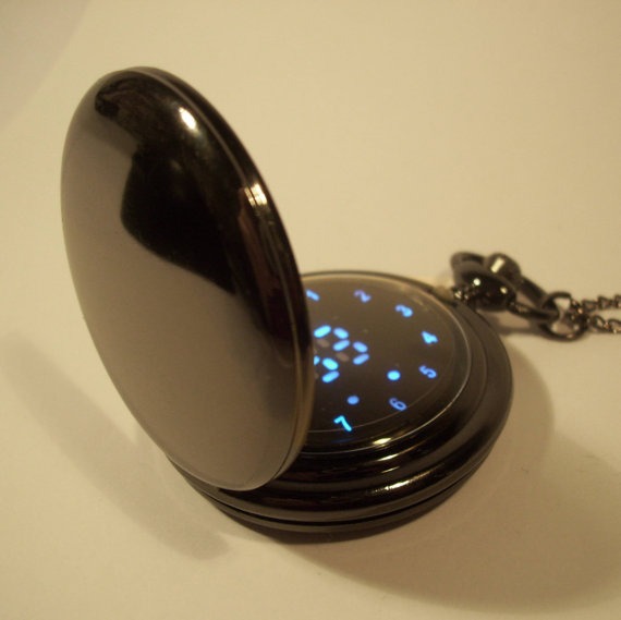Glossy black pocket watch with a futuristic blue LED display. Classic fob with a science fiction, steampunk twist. steampunk buy now online