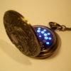 Bronze chinese full hunter dragon pocket watch with a blue LED display. Classic fob watch with a science fiction, steampunk twist. steampunk buy now online