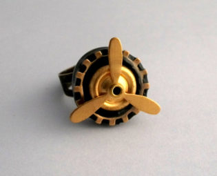 Steampunk ring propeller aviator pilot adjustable spinning antique brass polymer clay womens jewelry LARP clothing accessories geekery by blackunicorndesigns steampunk buy now online