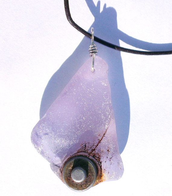 Purple seaglass steampunk pendant with a bolt or a stud of metal engrained in it, comes on a leather thong necklace. 2" x 1.5" + approx by WildAtlanticCraft steampunk buy now online