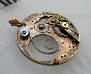 Steampunkology Drop Spring Necklace Antique Pocket Watch Movement Plate Gears Mainspring Moving Parts & Sapphire Blue Accent Screw Steampunk by Steampunkology steampunk buy now online