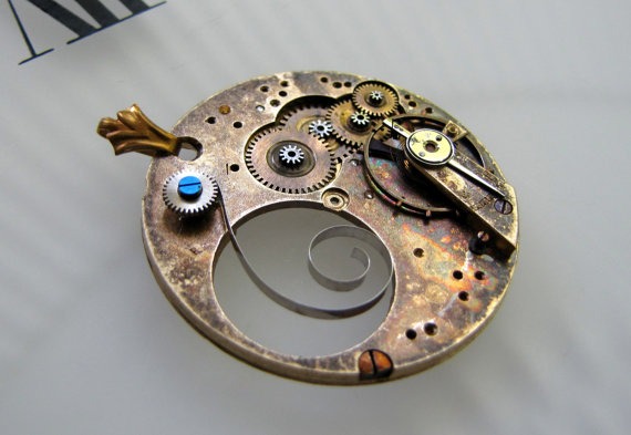 Steampunkology Drop Spring Necklace Antique Pocket Watch Movement Plate Gears Mainspring Moving Parts & Sapphire Blue Accent Screw Steampunk by Steampunkology steampunk buy now online
