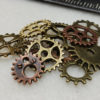 Steampunk Crafting Gears: lot of 12 Small Metal Clockwork Gears, brass, copper, bronze. Weathered Steam Punk Costume Jewelry Accessories by TheSkimDotNet steampunk buy now online