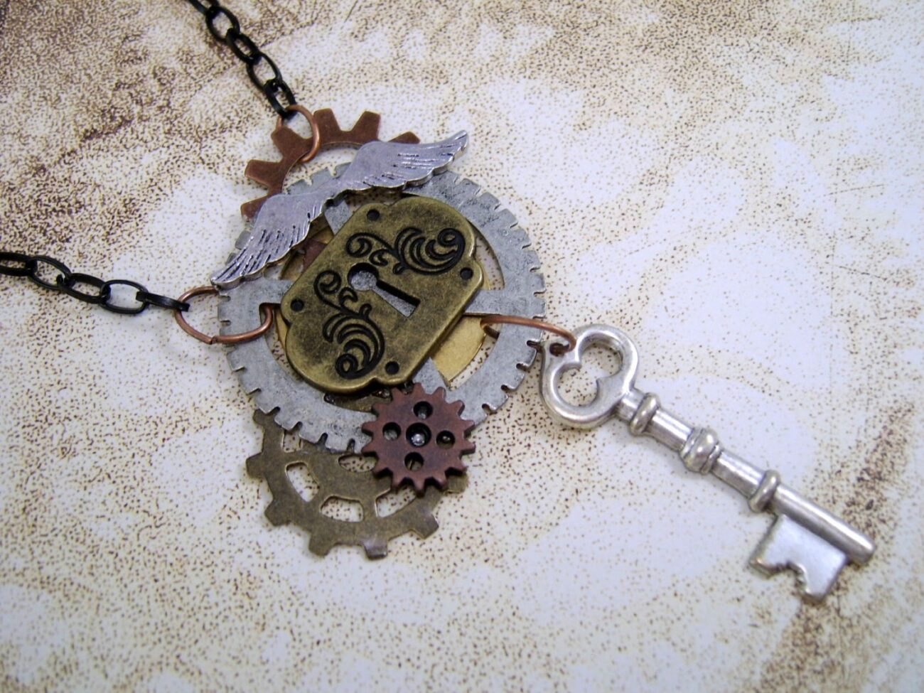 Whimsical Flying Gears Collage Necklace steampunk buy now online