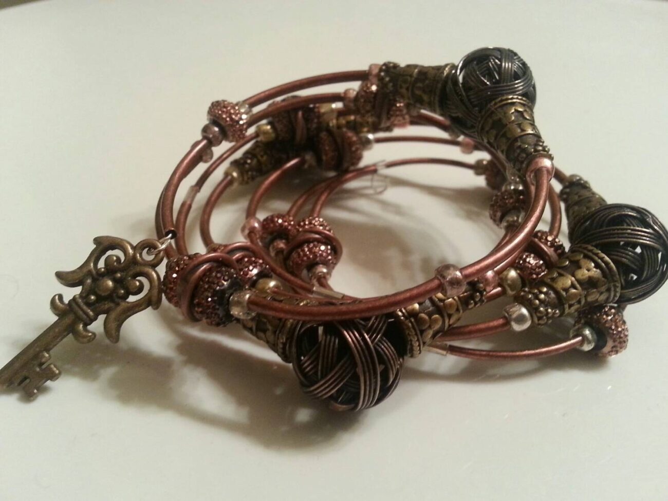 Copper and Bronze tone Steampunk Coil Wrap Metal Bracelet with Key charms steampunk buy now online