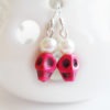 Pink vintage style skull earrings with ivory glass pearls and silver hooks steampunk buy now online