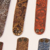 Steampunk cuff wristband with gears made out of leather available in several colours metallic by BarbwireandRoses steampunk buy now online