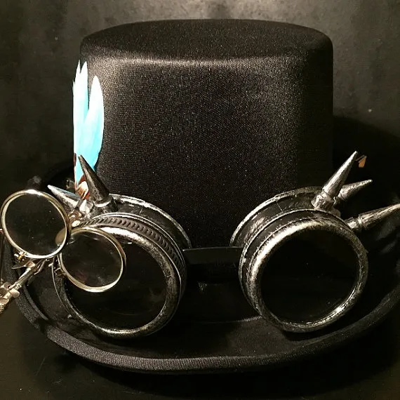 Black Steampunk Top Hat, Cyber Punk, Retro, With Silver Effect Spikey Goggles, With Eye Loupes And Turquoise Goose Feather by Steampunkbyben steampunk buy now online