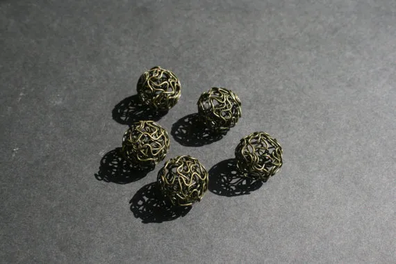 Bronze tone Hollow Twist Ball wire beads x 5. by JewellerySmith steampunk buy now online