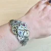 Steampunk silver bracelet with cogs, gears, watch mecanism and purple crystal by Myriambijoux steampunk buy now online