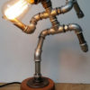 Iron pipe lamp - The Running Man by PureIron steampunk buy now online