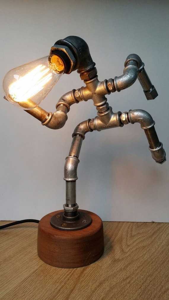 Iron pipe lamp - The Running Man by PureIron steampunk buy now online