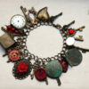 Steampunk charm bracelet with antique, vintage and contemporary charms // Red, brass and bronze // Neo-Victorian cosplay jewellery gift her by TheArkanaWorkshop steampunk buy now online