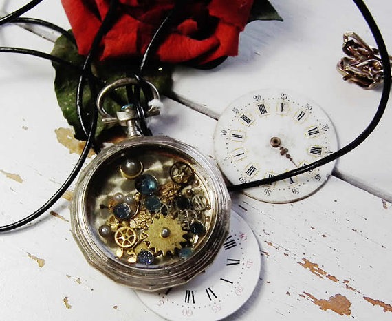 Steampunk unisex pendant made of an old pocket watchcase, resin, a dial,gears, blue crystals and gears by FranZainalSteampunk steampunk buy now online