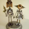 Robot Secret Agent Wedding Cake Topper with Ray Gun Bride Holding Hands Lilly Bouquet Wood Statues by buildersstudio steampunk buy now online