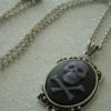 Purple skull and crossbones necklace by OctoberPetals steampunk buy now online