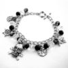 Pirate charm bracelet, silver charms, skull and crossbones, nautical, anchor, black & clear beads by PirateTreasures steampunk buy now online