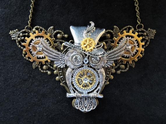 Steampunk jewelry Owl in top hat bib necklace - bronze filigree base, silver winged owl and top hat charms, golden cogs gears & rhinestones by KindHeartsEmporium steampunk buy now online