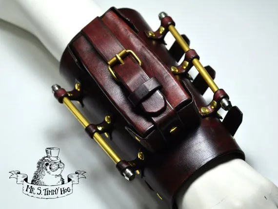 A little bigger steampunk explorer's bracer. With brass protecton bars and useful pocket. by TimmyHog steampunk buy now online A little bigger steampunk explorer's bracer. With brass protecton bars and useful pocket. by TimmyHog steampunk buy now online