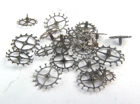 Steampunk Watch Pieces and Parts and Pieces - 25 Vintage Silver Escape Wheels Gears Cogs Wheels by AllGearedUp steampunk buy now online