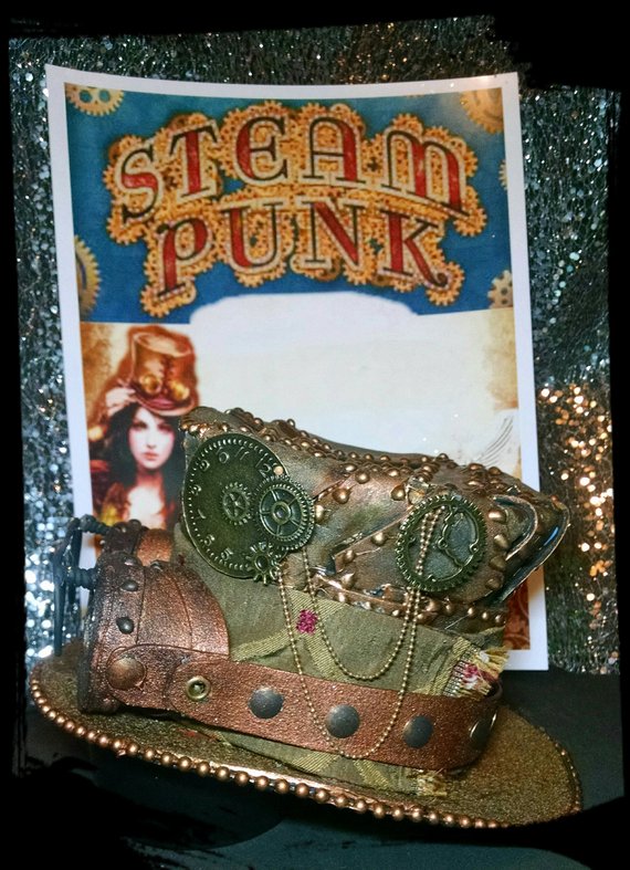 Steampunk top hat featuring hand crafted steampunk goggles, mini mad hatter steampunk top hat, cosplay top hat by Girlsjustwannahavfun steampunk buy now online