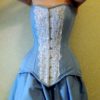 Light blue steel-boned overbust hourglasses corset for tight lacing covered by chantilly laces. Lace Addicted Corsettery collection. by Corsettery steampunk buy now online