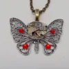 Steampunk butterfly pendant necklace with a vintage watch.Steampunk jewelry by slotzkin steampunk buy now online