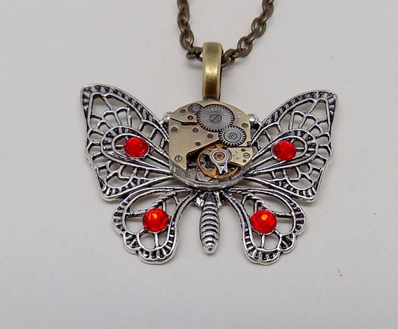 Steampunk butterfly pendant necklace with a vintage watch.Steampunk jewelry by slotzkin steampunk buy now online