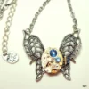 Steampunk Wings Necklace with Blue Swarovski Crystals, Neo Victorian Edwardian Fantasy,Ruby Jeweled, Rose Gold,Filigree Necklace by STEAMPUNKitis steampunk buy now online Steampunk Wings Necklace with Blue Swarovski Crystals, Neo Victorian Edwardian Fantasy,Ruby Jeweled, Rose Gold,Filigree Necklace by STEAMPUNKitis steampunk buy now online