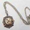Steampunk necklace, vintage watch movement in antique silver setting on antique silver chain by PirateTreasures steampunk buy now online