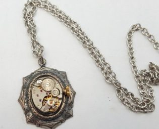 Steampunk necklace, vintage watch movement in antique silver setting on antique silver chain by PirateTreasures steampunk buy now online