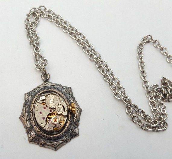 Steampunk necklace, vintage watch movement in antique silver setting on antique silver chain by PirateTreasures steampunk buy now online