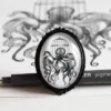 Brooch with octopus in a birdcage drawing - handmade jewel created with printed illustration by Saraelanillustration steampunk buy now online