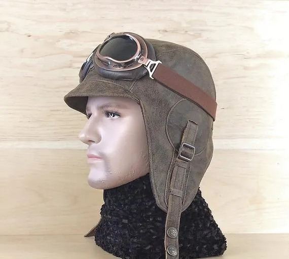Aviator Hat, Leather Motorcycle Helmet, Pilot Cap, WW2 Military Steampunk Hat, aviation goggles, Leather Old Brown, for Men and Women CA02 by CoteCuir steampunk buy now online Aviator Hat, Leather Motorcycle Helmet, Pilot Cap, WW2 Military Steampunk Hat, aviation goggles, Leather Old Brown, for Men and Women CA02 by CoteCuir steampunk buy now online