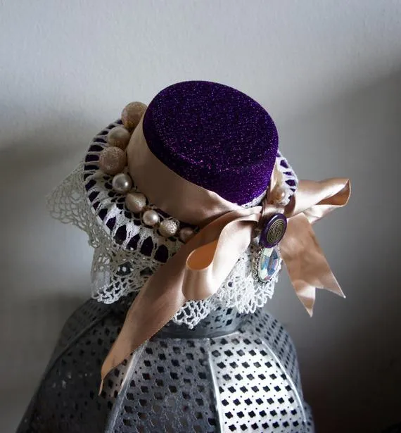 Beautiful One Of A Kind Purple Mini Top Hat Fascinator With Vintage Lace Trim Light Dusty Pink Satin Ribbon And Vintage Bead Button Details by IndustriousImaginare steampunk buy now online Beautiful One Of A Kind Purple Mini Top Hat Fascinator With Vintage Lace Trim Light Dusty Pink Satin Ribbon And Vintage Bead Button Details by IndustriousImaginare steampunk buy now online