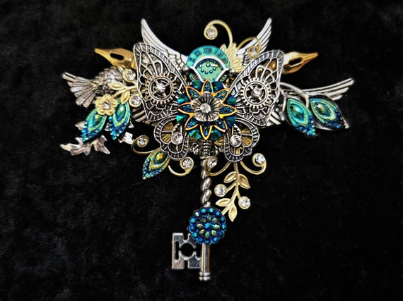 Romantic Steampunk Fantasy Vintage-style "Key to my Heart" pin brooch in blue, silver and gold + silver filigree butterfly, key, & crystals by KindHeartsEmporium steampunk buy now online