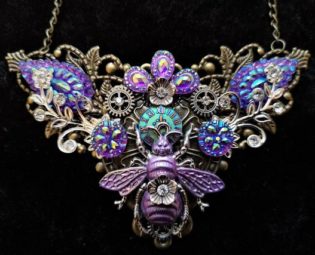 Stunning iridescent Steampunk Fantasy Queen Bee Necklace in purple pink and blue tones with clockface, flowers diamante rhinestone crystals by KindHeartsEmporium steampunk buy now online