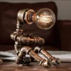 Vintage Table Lamp Retro Industrial Iron Water Pipes Robot Table lamp Steampunk Desktop Light(Not Included Bulb) steampunk buy now online Vintage Table Lamp Retro Industrial Iron Water Pipes Robot Table lamp Steampunk Desktop Light(Not Included Bulb) steampunk buy now online