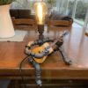 Steampunk style table lamp - guitar player by SteampunkByAdam steampunk buy now online