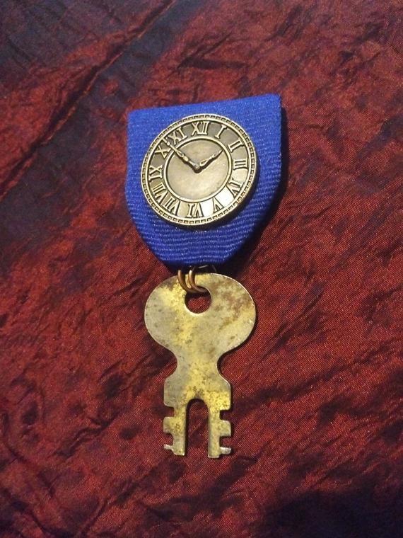 Tardis Key, Timelord Medal: Brass Clock and 1905 Vintage Split Key on Blue Ribbon, Doctor Who / Steampunk Medal by TorchandArrow steampunk buy now online