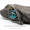 Aqua Steampunk dragon eye pendant/brooch by CharlieMorgon steampunk buy now online