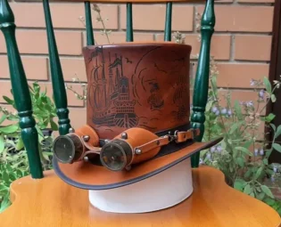Nautical theme/ Chinese Junk Ship etched top quality leather Steampunk Top Hat with vintage style aviator goggles by CobbandCoHats steampunk buy now online